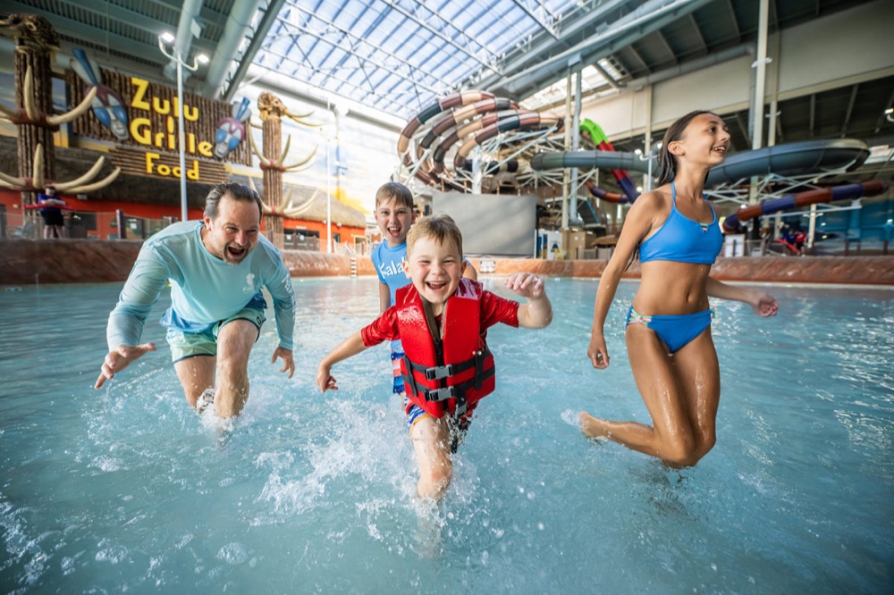 Family playing in Kalahari's indoor waterpark in Wisconsin Dells